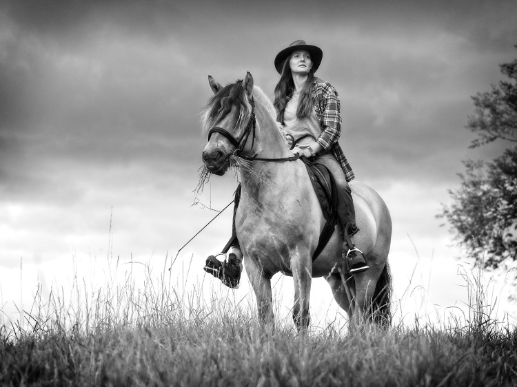 Woman on horse. Equine equestrian photo shoot prize winner