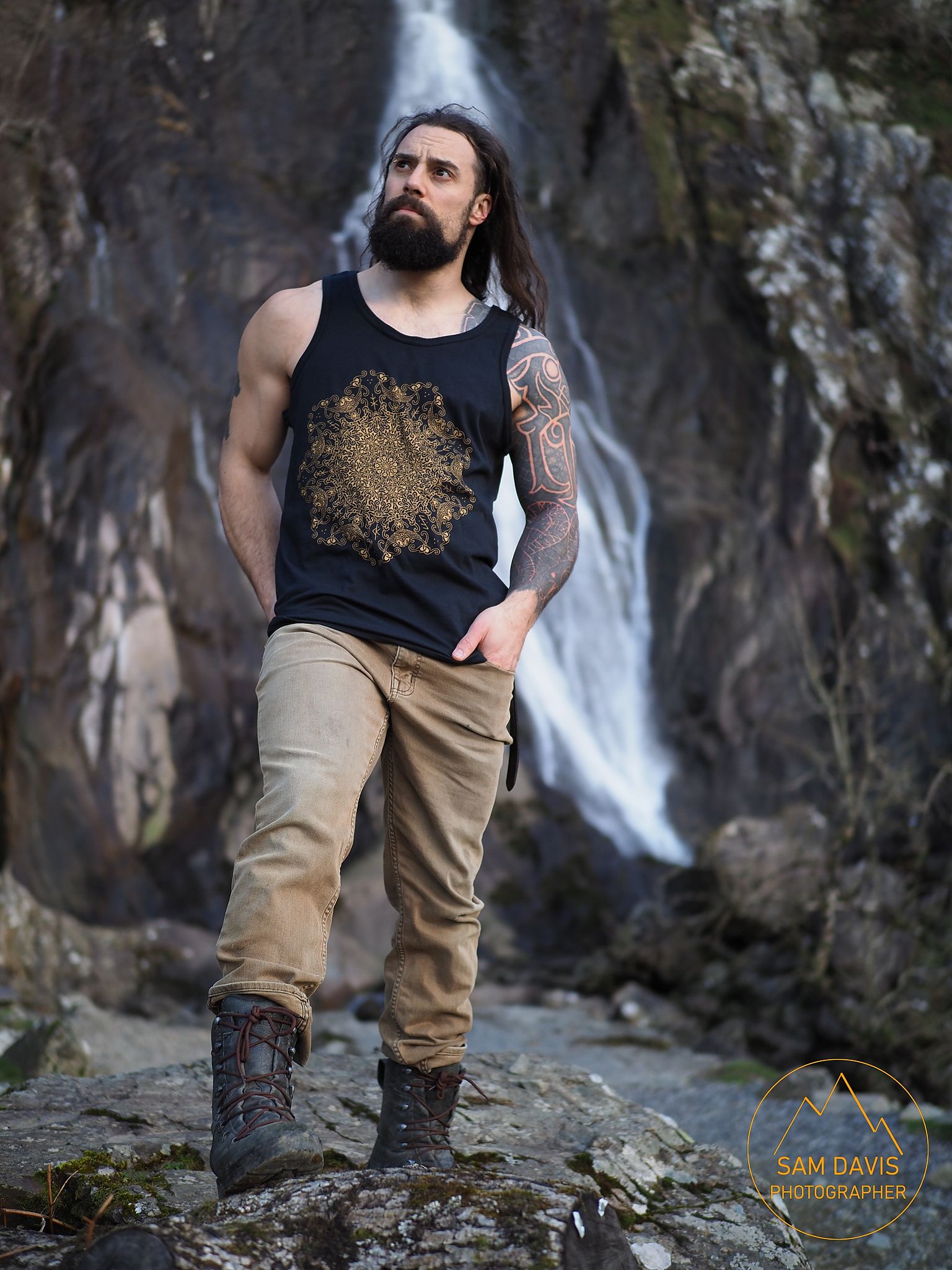 Ed Gamester modelling for Northern Fire at Aber Falls, North Wales, UK. https://www.northernfiredesigns.com/ , www.samsphotogallery.comsFashion Photoshoot. Sam Davis Photographer. Photographer for hire Wales.